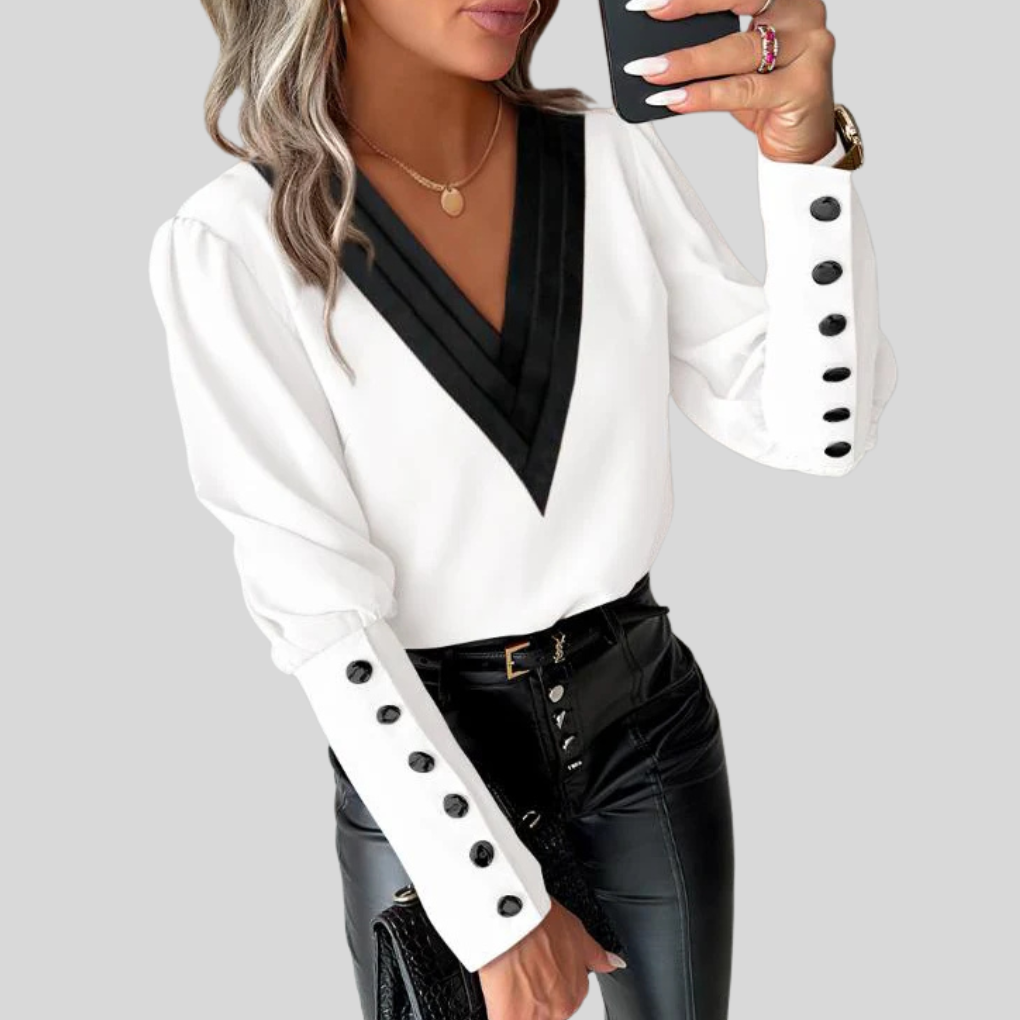 Blouse met knoopjes aan de voorkant en lange mouwen voor dames – opvallende mouwen met casual elegantie