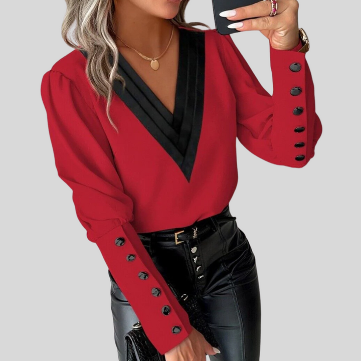 Blouse met knoopjes aan de voorkant en lange mouwen voor dames – opvallende mouwen met casual elegantie