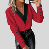Blouse met knoopjes aan de voorkant en lange mouwen voor dames – opvallende mouwen met casual elegantie