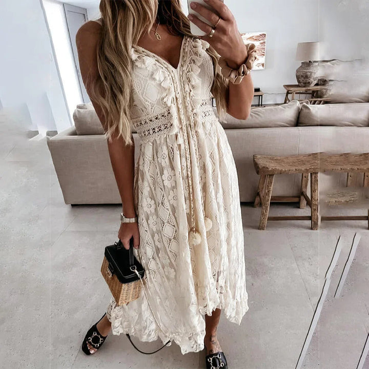 BreezeCharm – Boho-kanten jurk met strik en kwastjes
