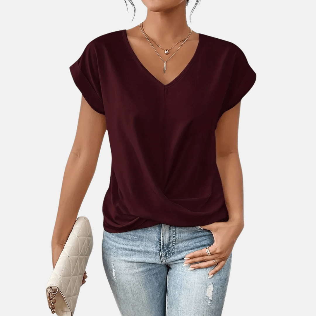Damesblouse met V-hals en gedrapeerde zoom