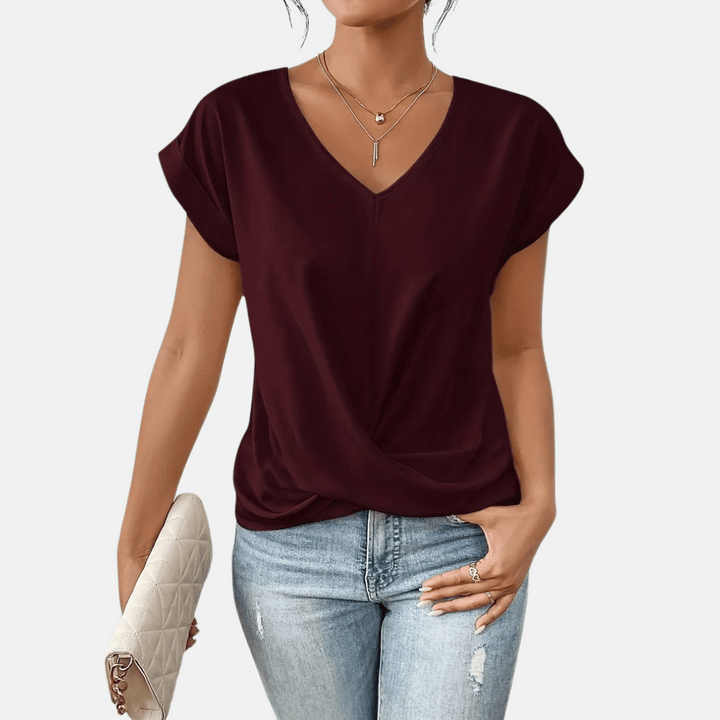 Damesblouse met V-hals en gedrapeerde zoom
