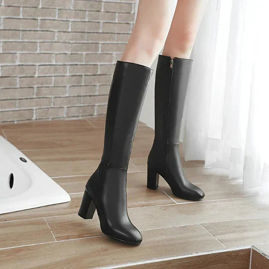 Dameslaarzen met hak en rits, kniehoog. Elegant design gecombineerd met dagelijks comfort.