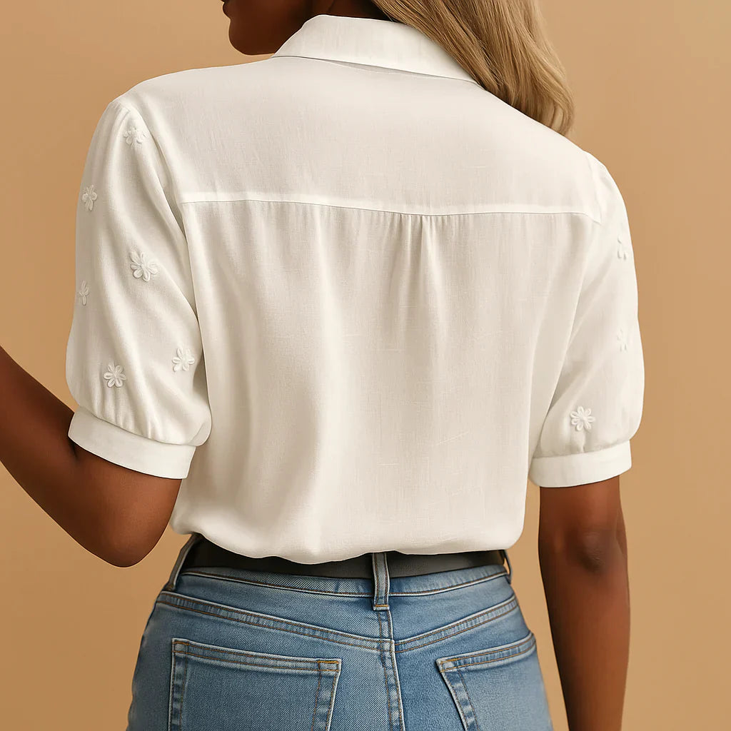 Geborduurde witte blouse met opstaande kraag