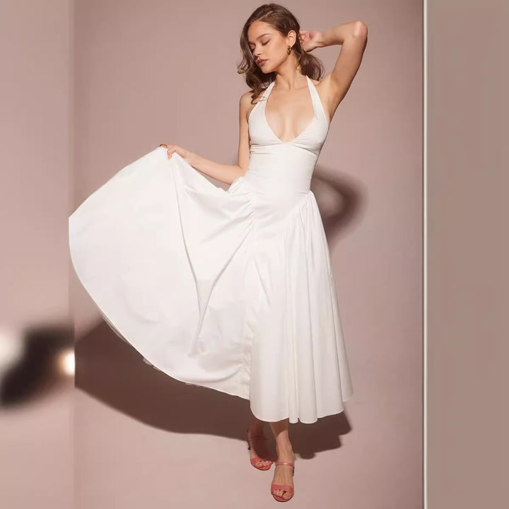 Halterjurk met Uitlopende Rok