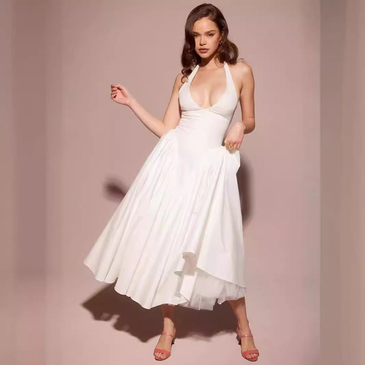 Halterjurk met Uitlopende Rok