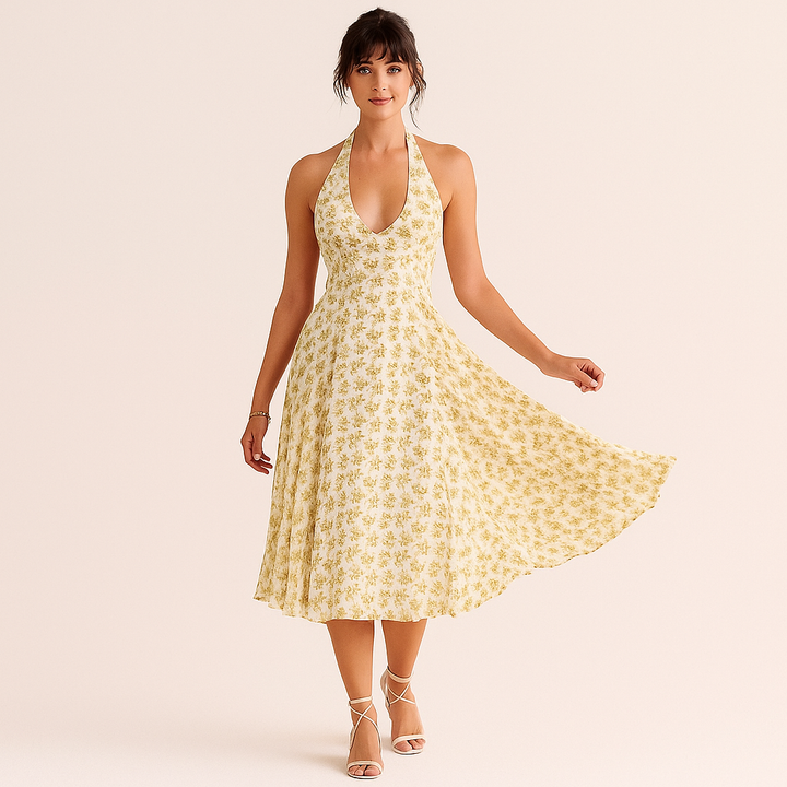 Halterjurk met bloemenprint en wijde rok