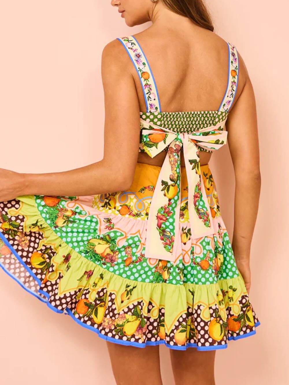 Korte jurk met fruitprint en speelse stroken