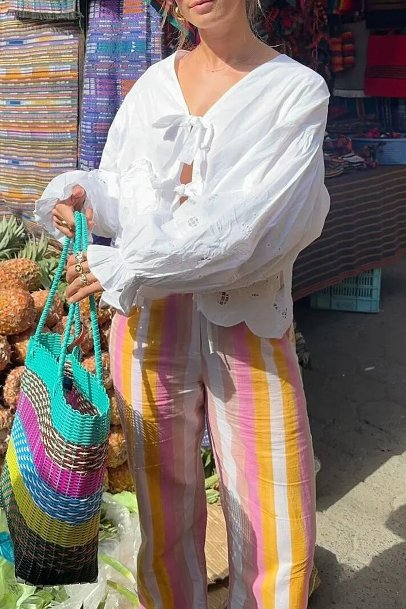 Top met Pofmouwen en Lintsluiting